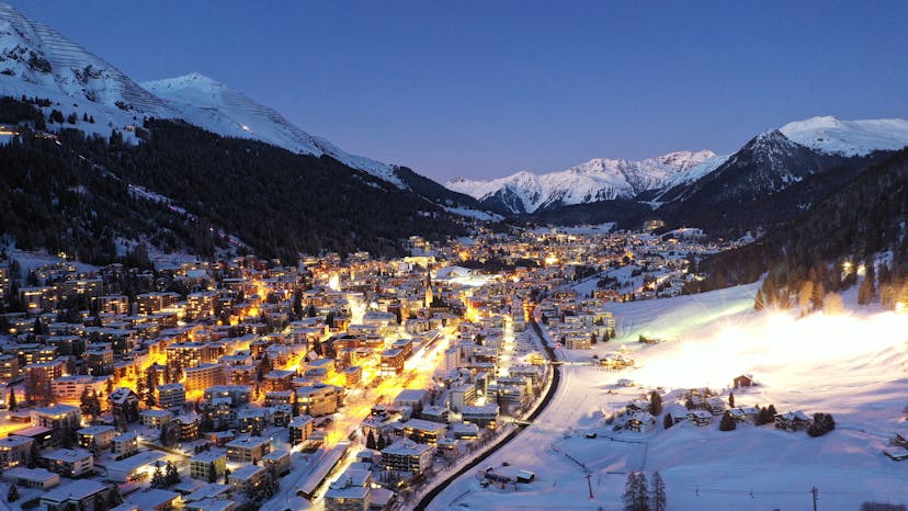 Busy Davos ski resort at night in winter