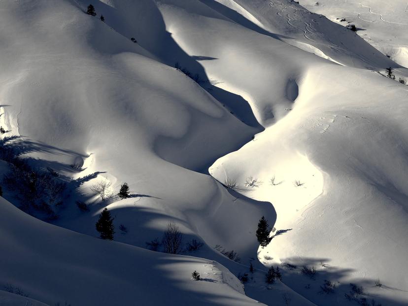 Snowy landscape of mountainous ski resort in Switzerland