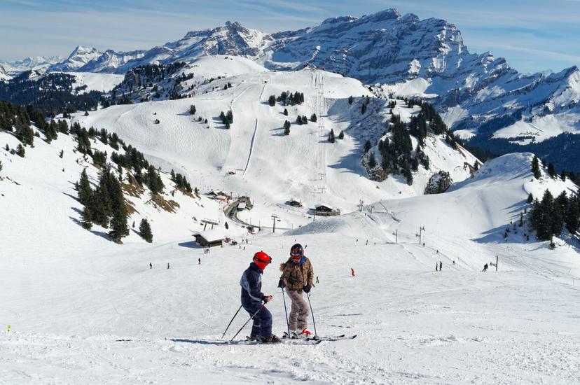 Skiers taking a break on Villars ski piste