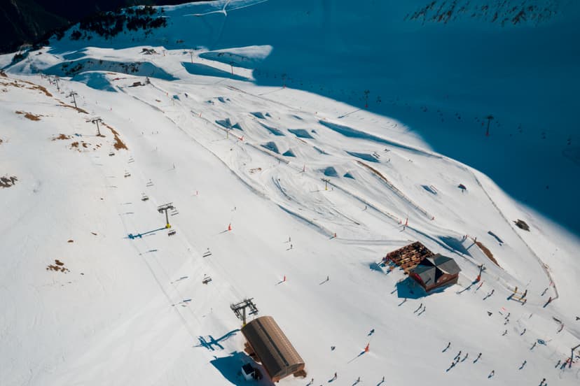 Skiiers and snowboarders enjoying ski slope in Arinsal Andorra