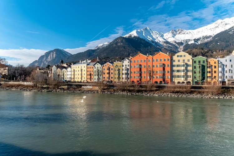 Innsbruck-tirol-houses-against-mountain-backdrop