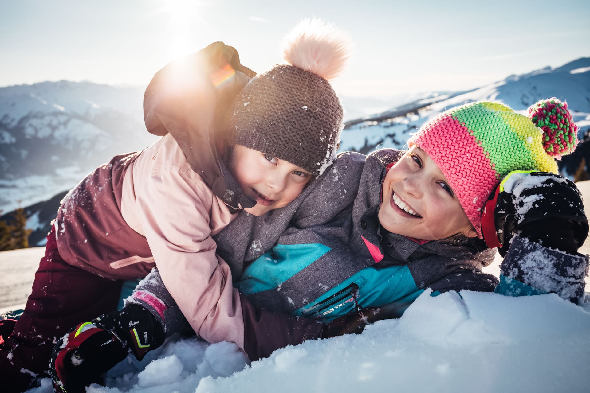 Smiling children in the snow