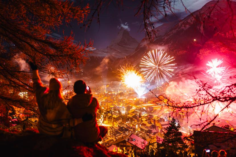 Friends watch Zermatt fireworks at night