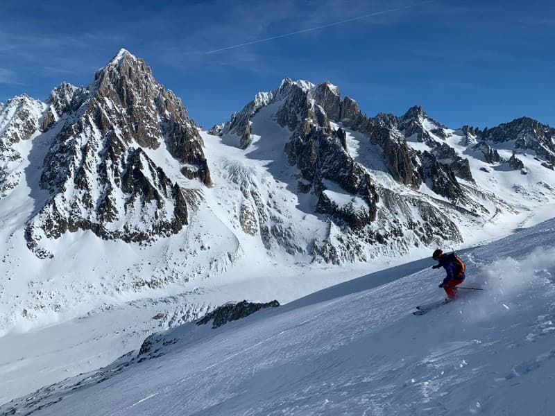 Skier skiing down Col Du Chardonnet pass in Argentiere Chamonix France